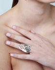 model wearing Architectural openwork silver ring, Dori collection Lavinia Fuksas Studio