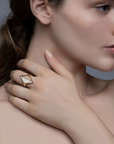Model wearing the Rekhale gold diamond ring, architectural Italian luxury jewellery