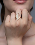 Model wearing the Rekhale gold diamond ring, architectural Italian luxury jewellery