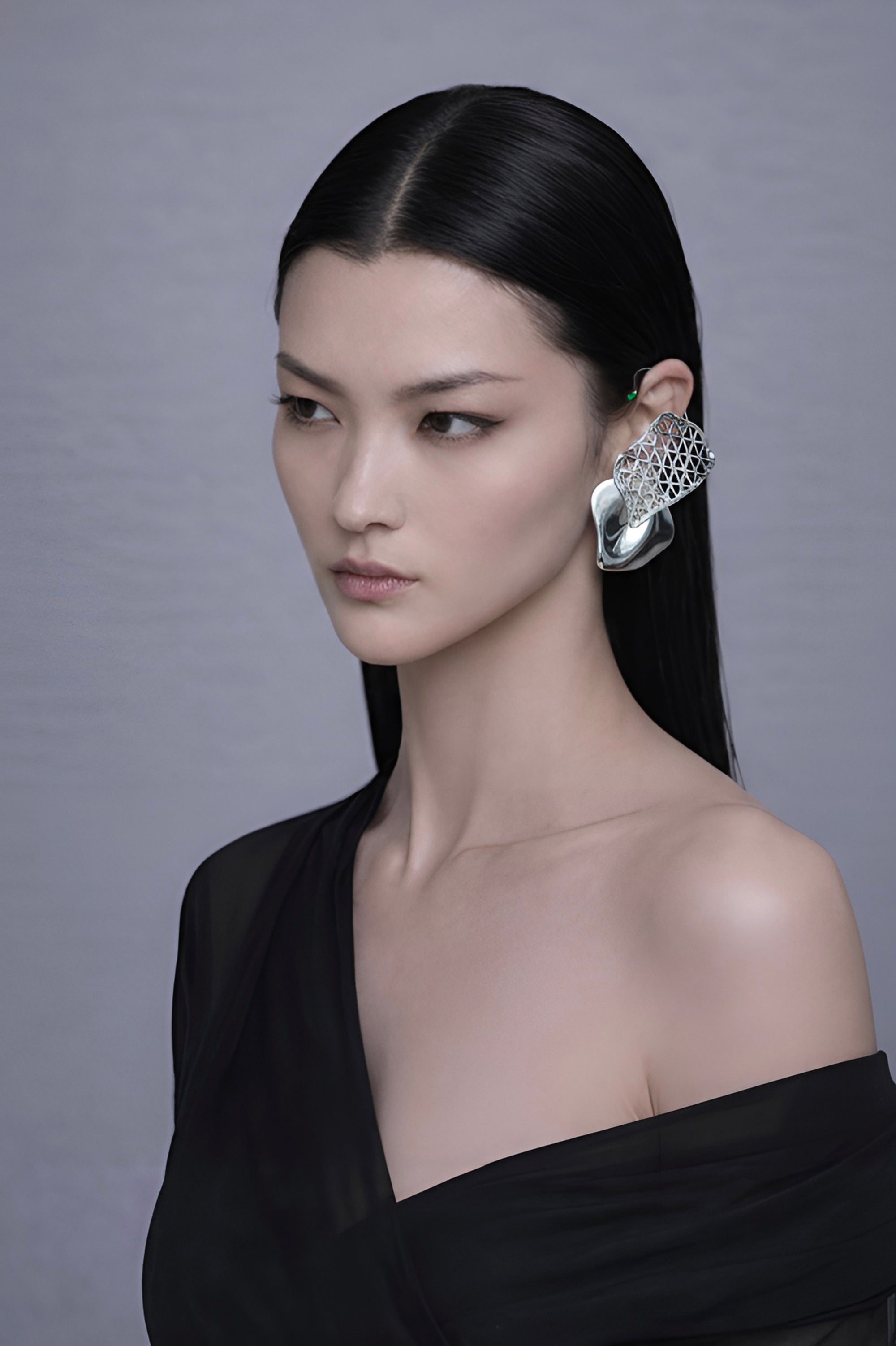 model wearing Otto silver earring in Sterling Silver 925 with layered plate design